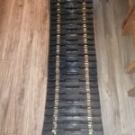 04-935GB | GBDistribution | Track for snowmobile - with guiding clip - 53 holes 104 in 1.97 pitch