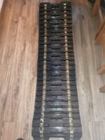 04-935GB | GBDistribution | Track for snowmobile - with guiding clip - 53 holes 104 in 1.97 pitch